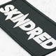 Нашивка ткана SKINDRED - LOGO (ofp-401) Изображение