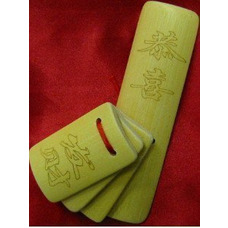 Трещетка из бамбука Изображение