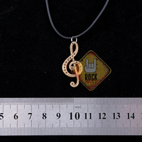 Кулон Скрипичный ключ с узором (бронзовый цвет) Изображение