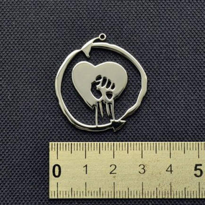 Кулон стальной Rise Against Изображение